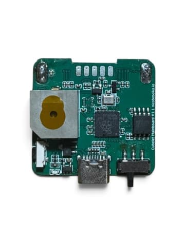 The first custom PCB designed for Cubelet, with its components and USB connector visible.