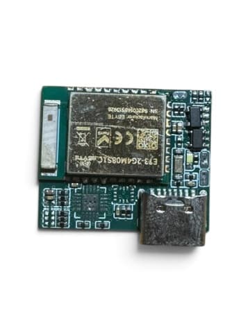 The first custom wearable board, with its wireless module, surface-mount components, and USB connector visible.