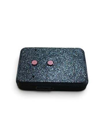 The first wearable proof of concept: a black 3D-printed module with two pink circular details and a USB connector.